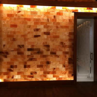 Backlit Salt Stone Walls With A Glass Door At A Private Home In Westlake Village, California