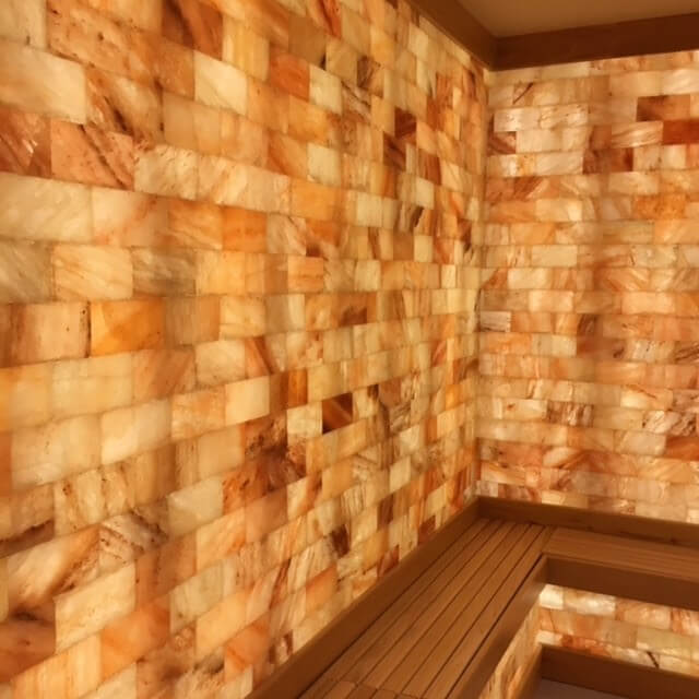 Jw Marriott Miami turnberry resort & spa. View of tile walls inside of spa room.