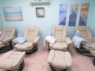 Natrium Halotherapy. Spa Room With 4 Lounge Chairs And Ottomans.