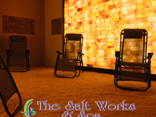 The Salt Works And Spa. 4 Lounge Chairs All Facing Each Other In Salt Room. Text Over Image Reads &Quot; The Salt Works &Amp; Spa Halotherapy - Wellness - Beauty&Quot;