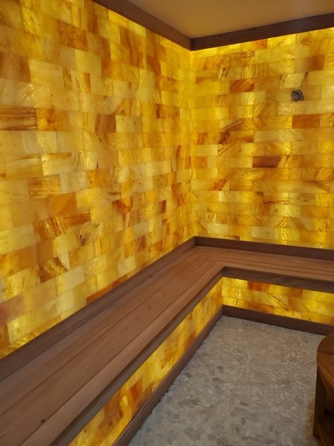 Bungalows.Room with a wooden bench and yellow wall.