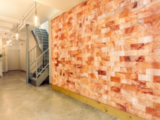 Rahav Wellness. View Of Tiled Wall Leading To A Flight Of Stairs Going Up Stairs