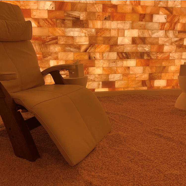 Breathe Salt and Sauna Close up image of Lounge chair in salt room