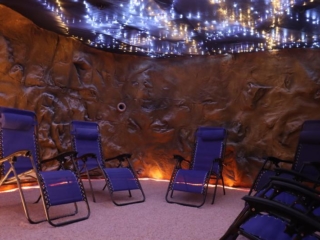 Five Lounge Chairs Facing Each Other In A Salt Cave In Halo Salt Cave And Spa In Kingston, Tennessee