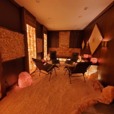 A Salt Therapy Room With 4 Chairs, Floor Salt, Himalayan Salt Bricks And Himalayan Salt Panels