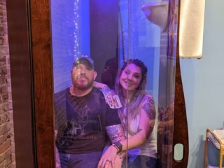 A Man And A Woman Sitting In A Salt Booth For A Salt Therapy Session At Solace Wellness Studio In Boston, Georgia.