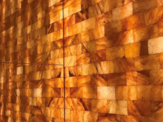 Sweet Be Wellness And Skin Clinic. Up-Close Shot Of Salt Brick Tiled Wall Inside A Salt Room