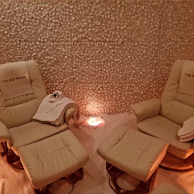 The Salt Room. 2 Recliners Facing Each Other In Small Salt Room.