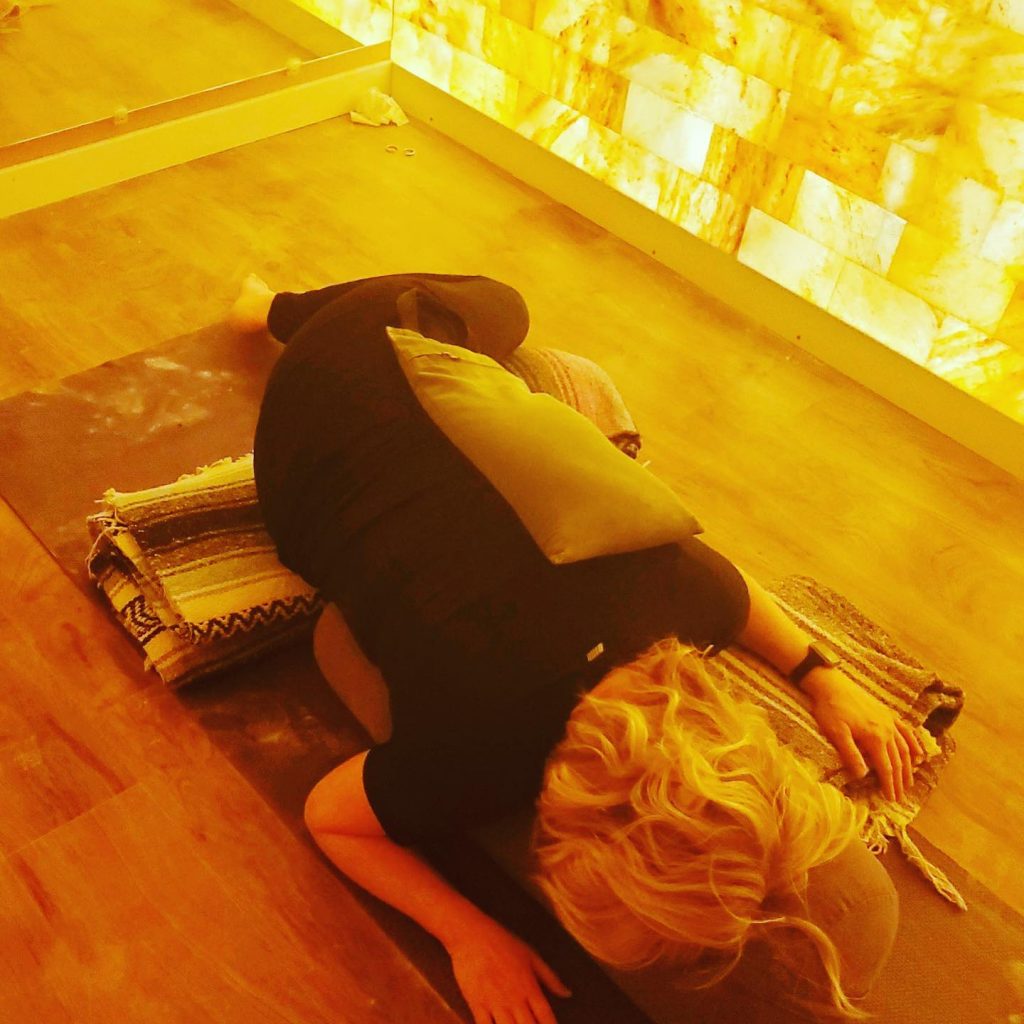 Sweet Be Wellness And Skin Clinic. Woman On The Floor Performs A Yoga Position