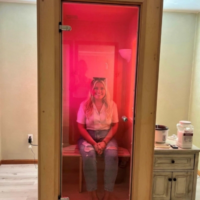 Woman sitting in a salt booth flex enjoying the respiratory benefits of salt therapy