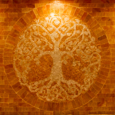 A Dark Yellow Salt Stone Wall With A Tree Made Out Of White Salt As The Wall'S Centerpiece At Purify Yoga
