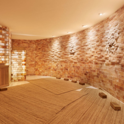 A Himalayan Salt Stone Therapy Room With Three Area Rugs At The Sojo Spa Club -In Edgewater, New Jersey