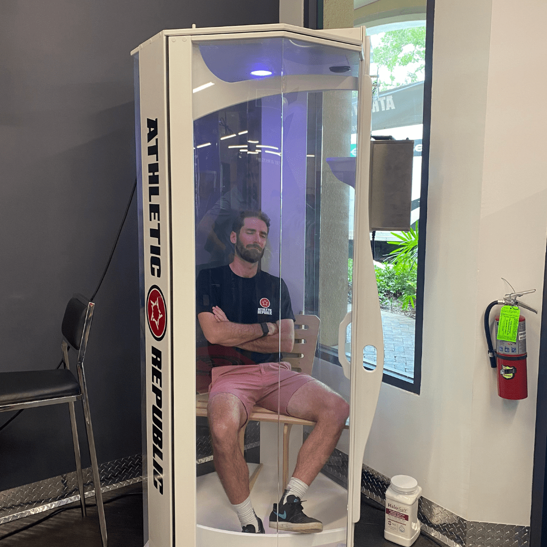 An Athlete During A Salt Therapy Session In A Salt Booth For Performance, Endurance, And Recovery.