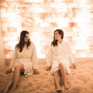 Image Of Two Women Enjoying A Salt Therapy Session In A Salt Room. | Salt Chamber